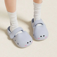 Thumbnail for Someone in white socks wears KittyNook Cat Co. Adorable Cat Face Comfort Sandals on a light floor.