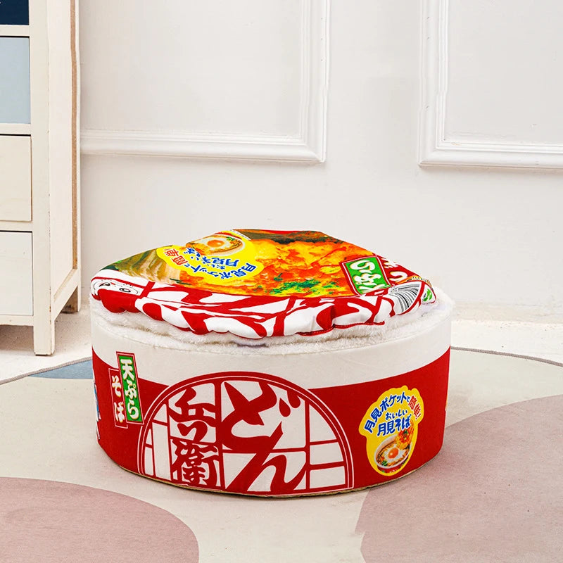 The Instant Noodles Cat Bed by KittyNook Cat Co. provides premium comfort, styled as a Japanese noodle cup.