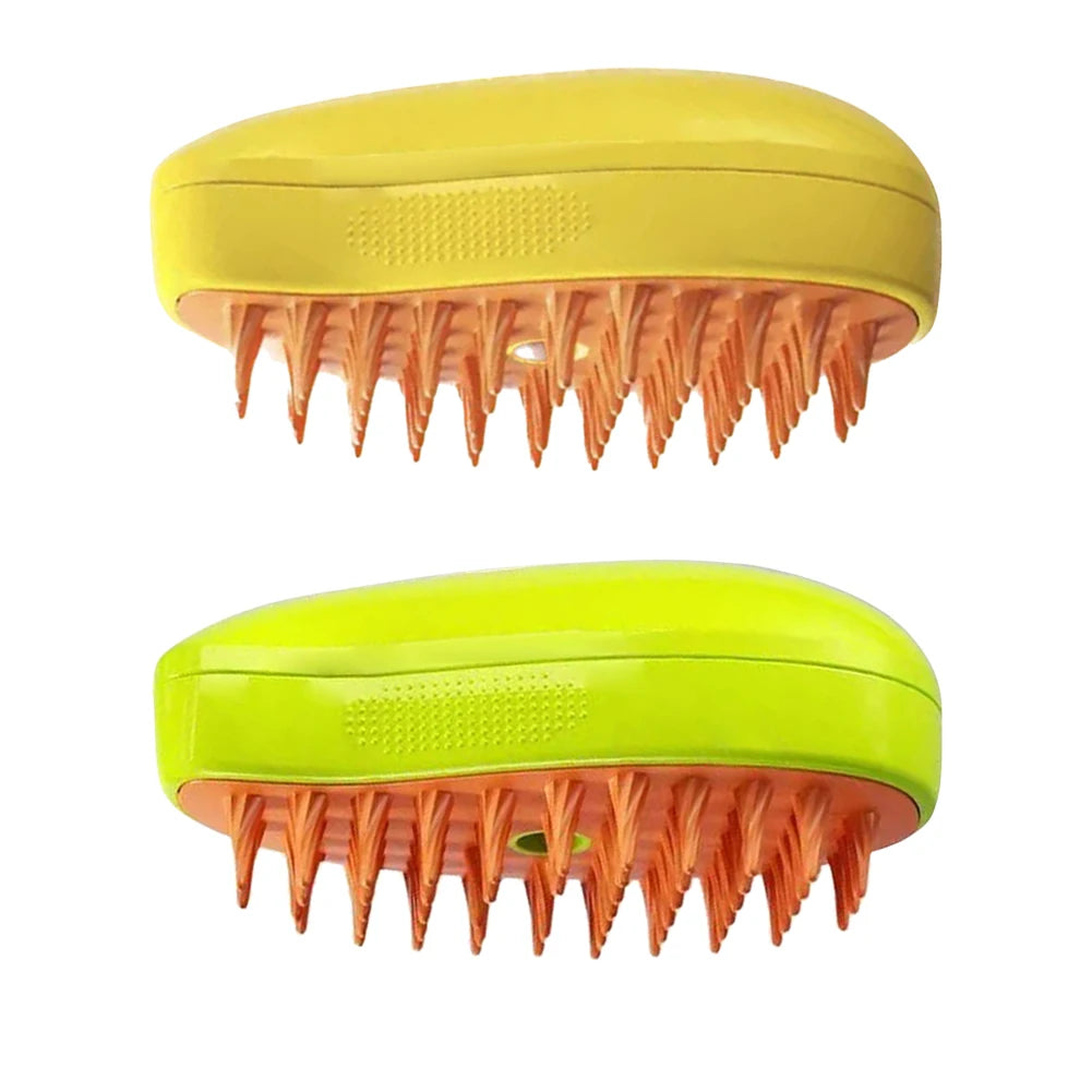 Two Electric Cat Grooming Brushes by KittyNook Cat Co. with yellow and green tops, orange bristles on white background.