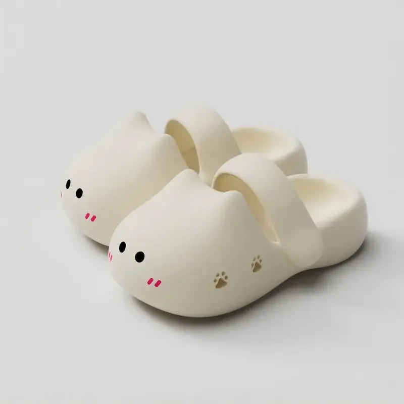 KittyNook Cat Co. Adorable Cat Face Comfort Sandals: cream cat-themed EVA shoes with paw prints and non-slip sole.