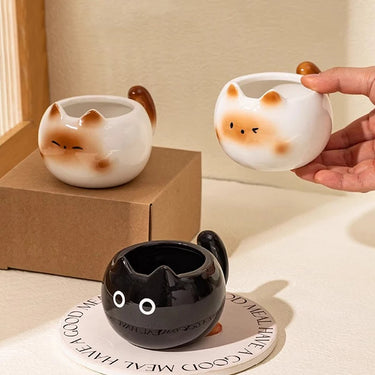 KittyNook Cat Co.'s Siamese Cat Coffee Cup is a unique round ceramic mug, perfect for any cat lover’s collection.