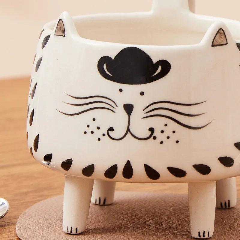 AdoraMeow Cat Mug with Feet close up on details