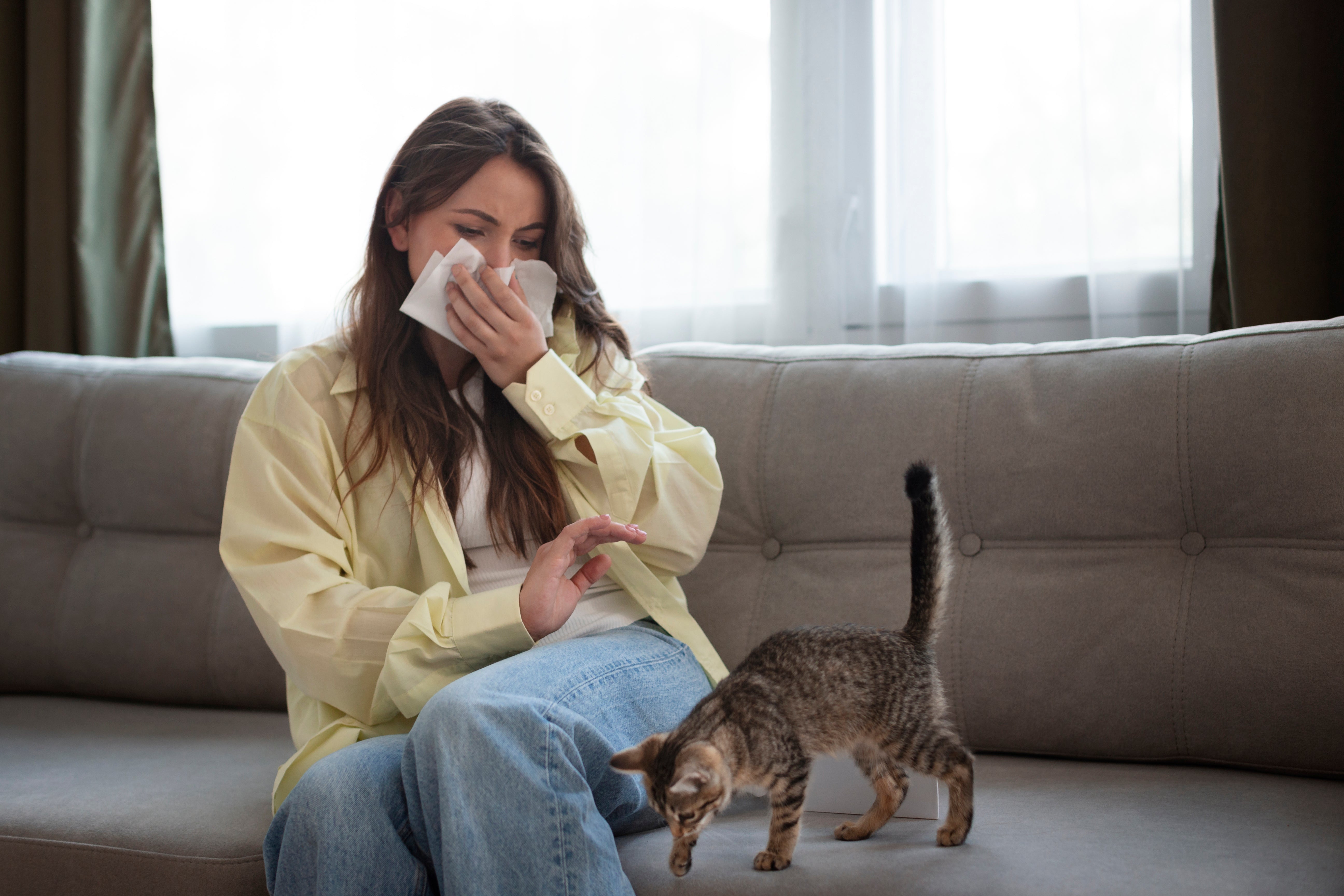 Woman suffering from cat allergy | Kitty Nook