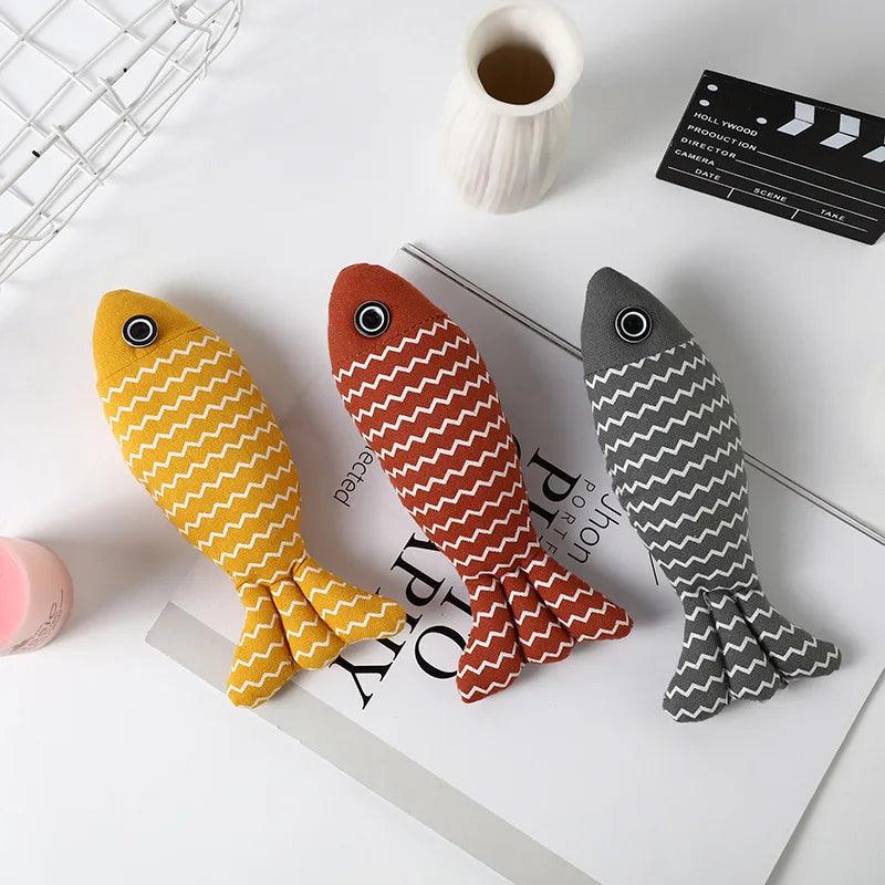 Linen Catch Fish Toy in red, yellow, and grey variants