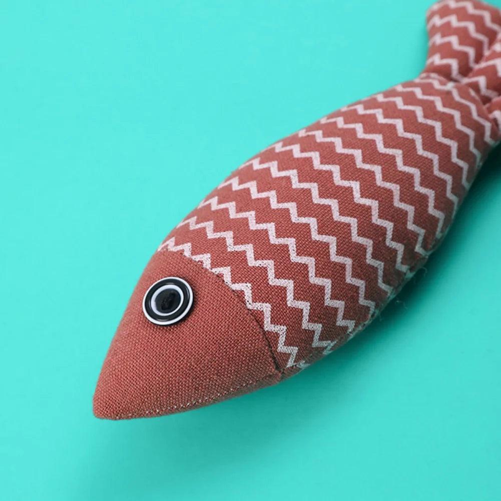 Linen Catch Fish Toy in red close up on the head