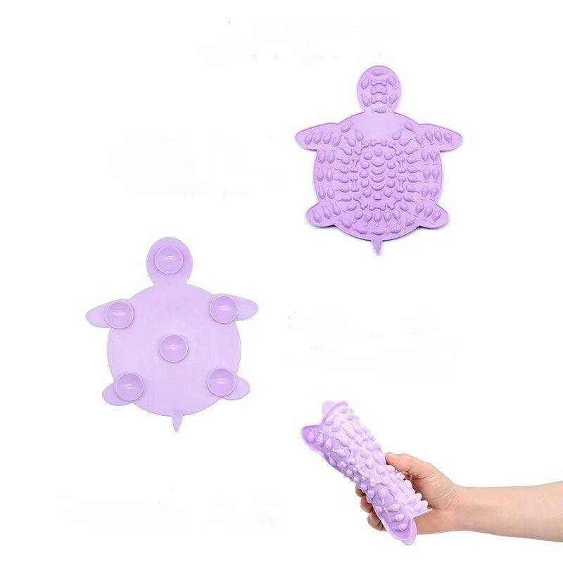 Turtle Treats Silicone Lick Mat in lilac with demonstration of its flexibility