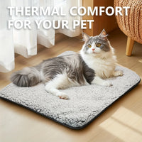 Thumbnail for Gray and white cat relaxing on KittyNook Cat Co.'s Comfy Thermal Cushion for Cats with 