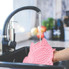 Load image into Gallery viewer, Turtle Treats Silicone Lick Mat in pink being washed in a sink