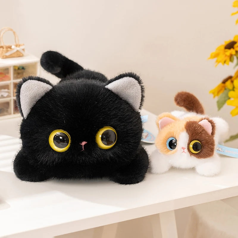 The KittyNook Cat Co. Cute Big Eyes Kitten Plush Pillow is the perfect cat lover gift for any occasion.