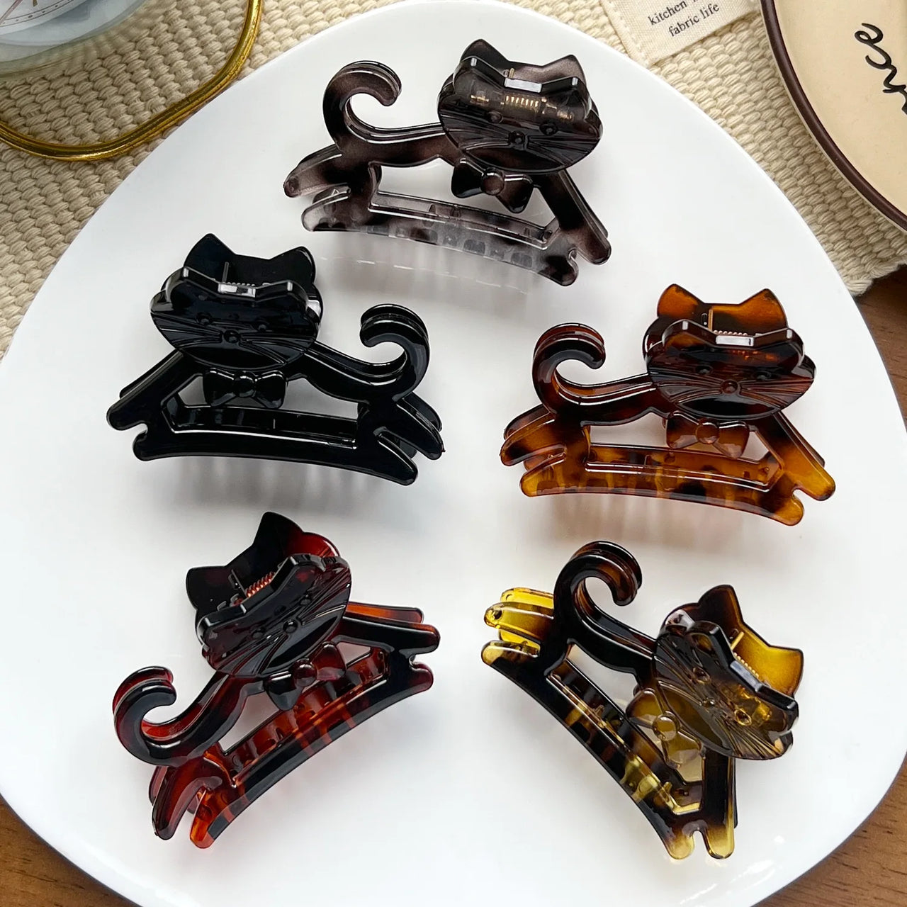 Five Cute Cat Hair Claw clips from KittyNook Cat Co. in assorted colors—stylish K-style hair accessories.