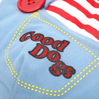 Thumbnail for Close-up of blue fabric, yellow stitching, red button, and 