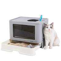 Thumbnail for A white and gray cat sits by KittyNook Cat Co.'s Purrfect Foldable Litter Solution with dual-entry and a top scoop.