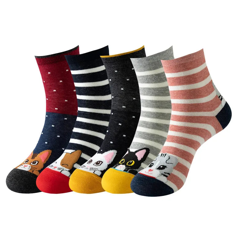 The Cute Meow & Snuggle Women’s Sock Set by KittyNook Cat Co. has 5 pairs with stripes, dots, and animal faces.