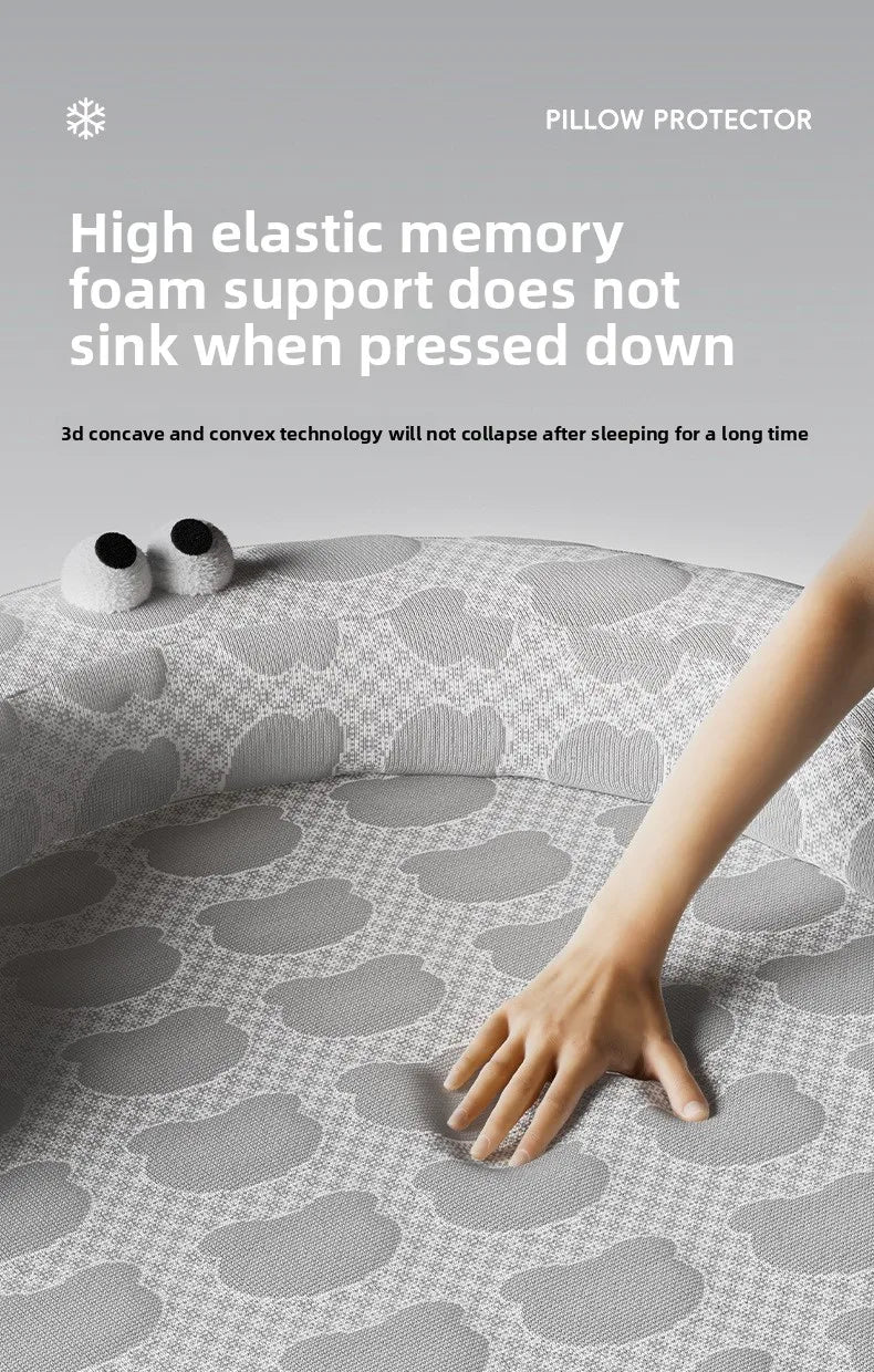 Hand pressing a gray Ice Silk Cat Nest by KittyNook Cat Co. with white text about memory foam support.