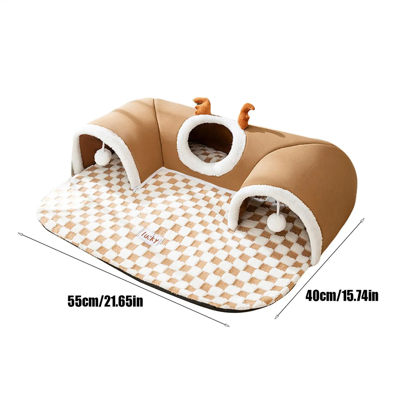 KittyNook Cat Co. Winter Warm Plush Tunnel Cat Bed with brown-white checks, dual archways, pom-poms, and antlers.