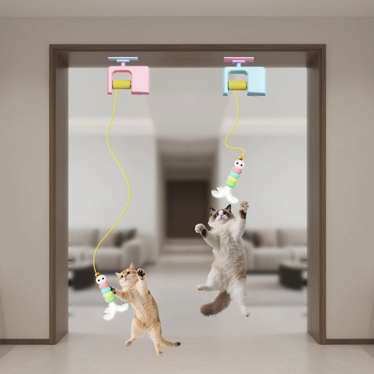 Two cats jump and play with KittyNook Cat Co.'s Elevate Playtime Interactive Hanging Toy—perfect for indoor cat exercise.