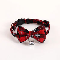 Thumbnail for KittyNook Cat Co. Christmas Cat Bow Tie with Jingle Bell—festive red plaid collar with snowflakes for your pet.