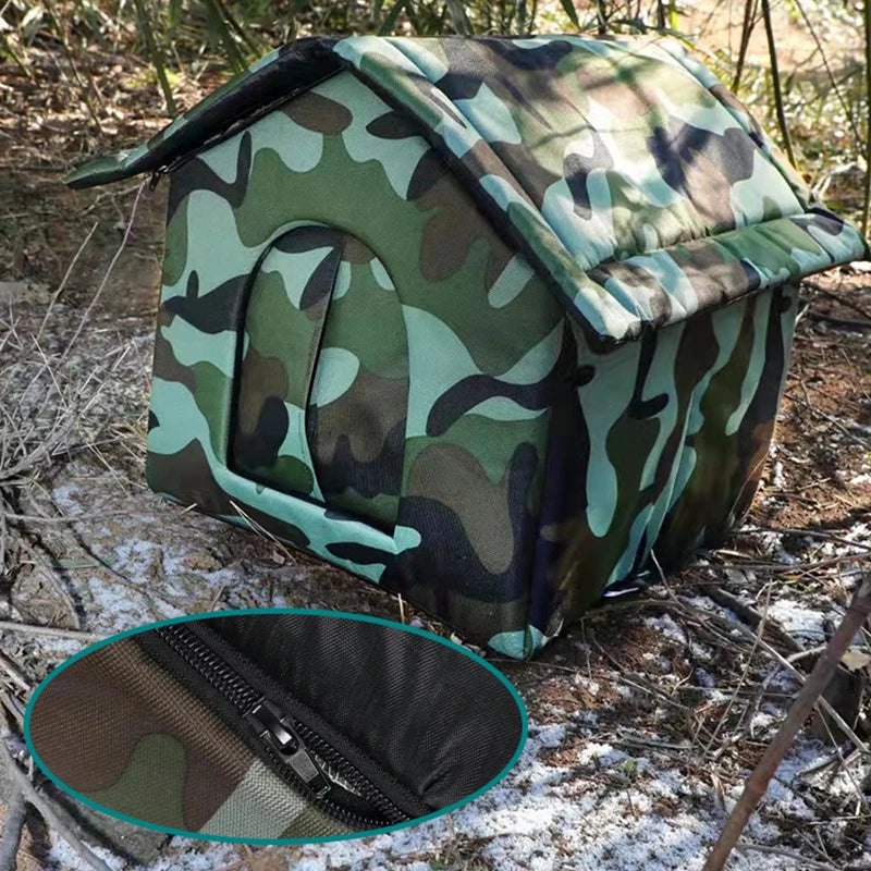 The KittyNook Cat Co. PurrFort Waterproof Outdoor Cat Cave features camo fabric and a sturdy zipper, shown in outdoor use.
