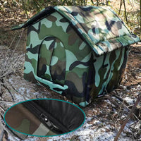Thumbnail for The KittyNook Cat Co. PurrFort Waterproof Outdoor Cat Cave features camo fabric and a sturdy zipper, shown in outdoor use.
