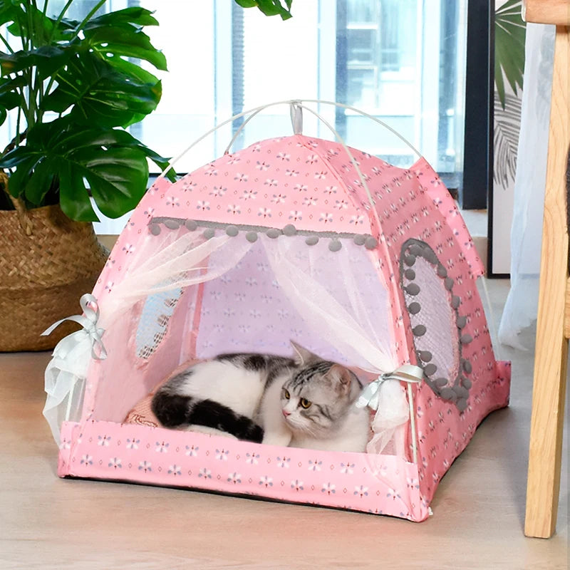 A white and gray cat lounges indoors in the Serene Petal Semi-Enclosed Cat Tent by KittyNook Cat Co.