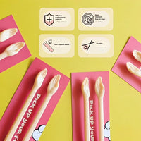 Thumbnail for Little Paws Silicone Training Chopsticks for Kids by KittyNook Cat Co. with info cards, shown on yellow background.