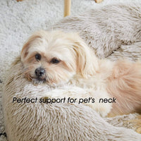 Thumbnail for Small dog resting on the KittyNook Cat Co. Warm & Soft Cat Sleeping Pod: perfect neck support for your pet.