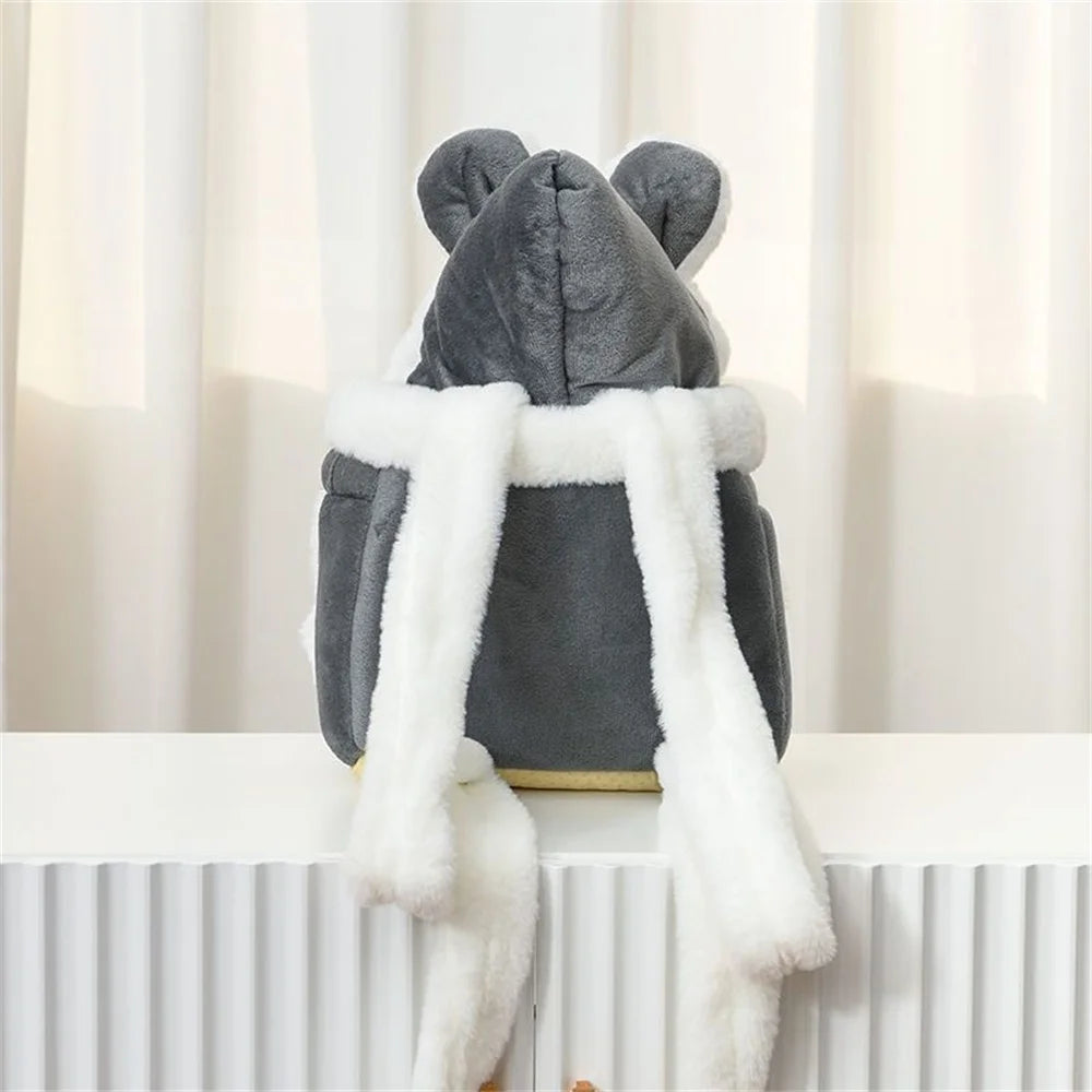The Stylish Pet Travel Bag by KittyNook Cat Co.—a plush gray backpack with bear ears, perfect for stylish pet travel.