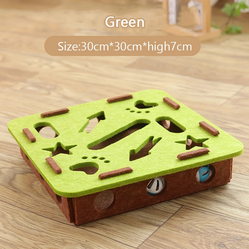 The Ultimate Puzzle Box Toy by KittyNook Cat Co.—green/brown, 30x30x7 cm, with balls inside and shaped holes.