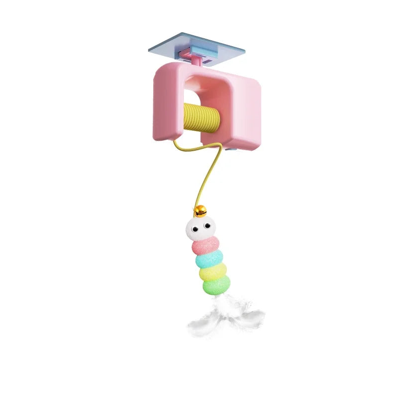 Elevate playtime with KittyNook Cat Co.'s interactive cat toy—pink, yellow, suction cup, pastel caterpillar, & feather.