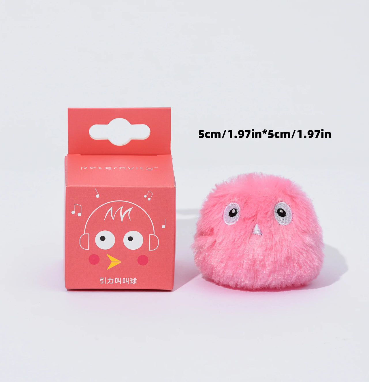 The KittyNook Cat Co. Interactive Cat Smart Ball Toy is a small pink fluffy toy with big eyes and a matching 5cm box.