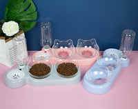 Thumbnail for KittyNook Cat Co. Automatic Water Renewal Cat Bowl and two cat-ear bowls with water bottles on the table.