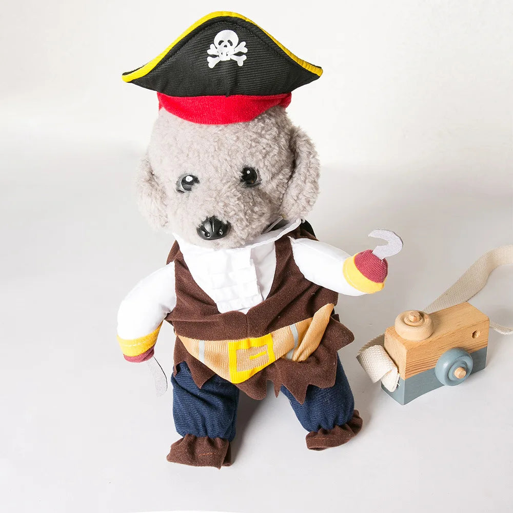 A small dog wears the KittyNook Cat Co. Funny Pirate Cat Halloween Costume with hat, hook hand, and toy camera.