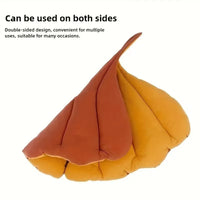 Thumbnail for KittyNook Cat Co. Leaf Pattern Cat Sleeping Mat, a reversible leaf-shaped pet mat with one orange and one yellow side.