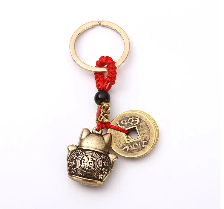KittyNook Cat Co.'s Lucky Paws Fortune Cat Keychain—cat charm, coin & red string for cute, organized keys.