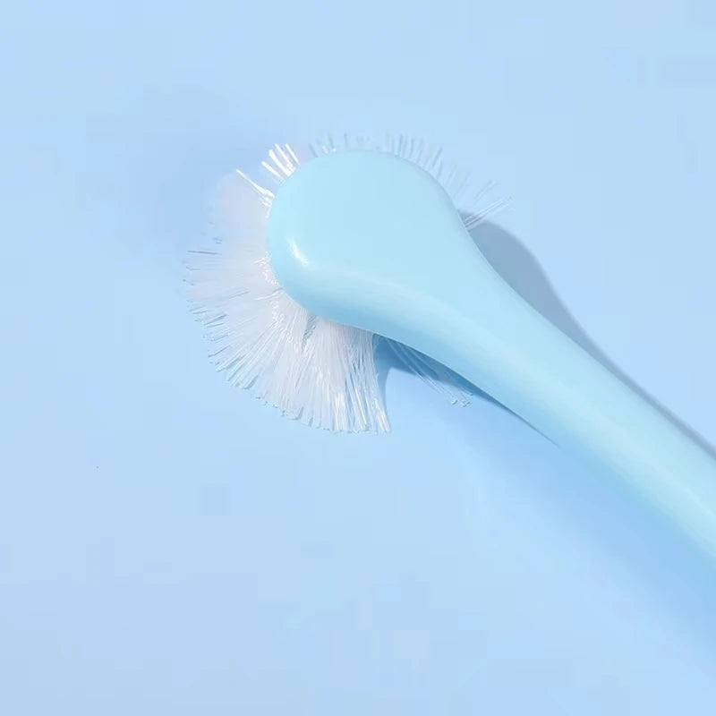 A close-up of the KittyNook Cat Co. Kitty Clean Micro Head Dental Brush in light blue with white bristles.