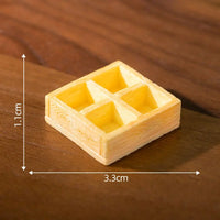 Thumbnail for A small wooden tray displays the KittyNook Cat Co. Creative Cat Doll Car Ornament with four compartments.