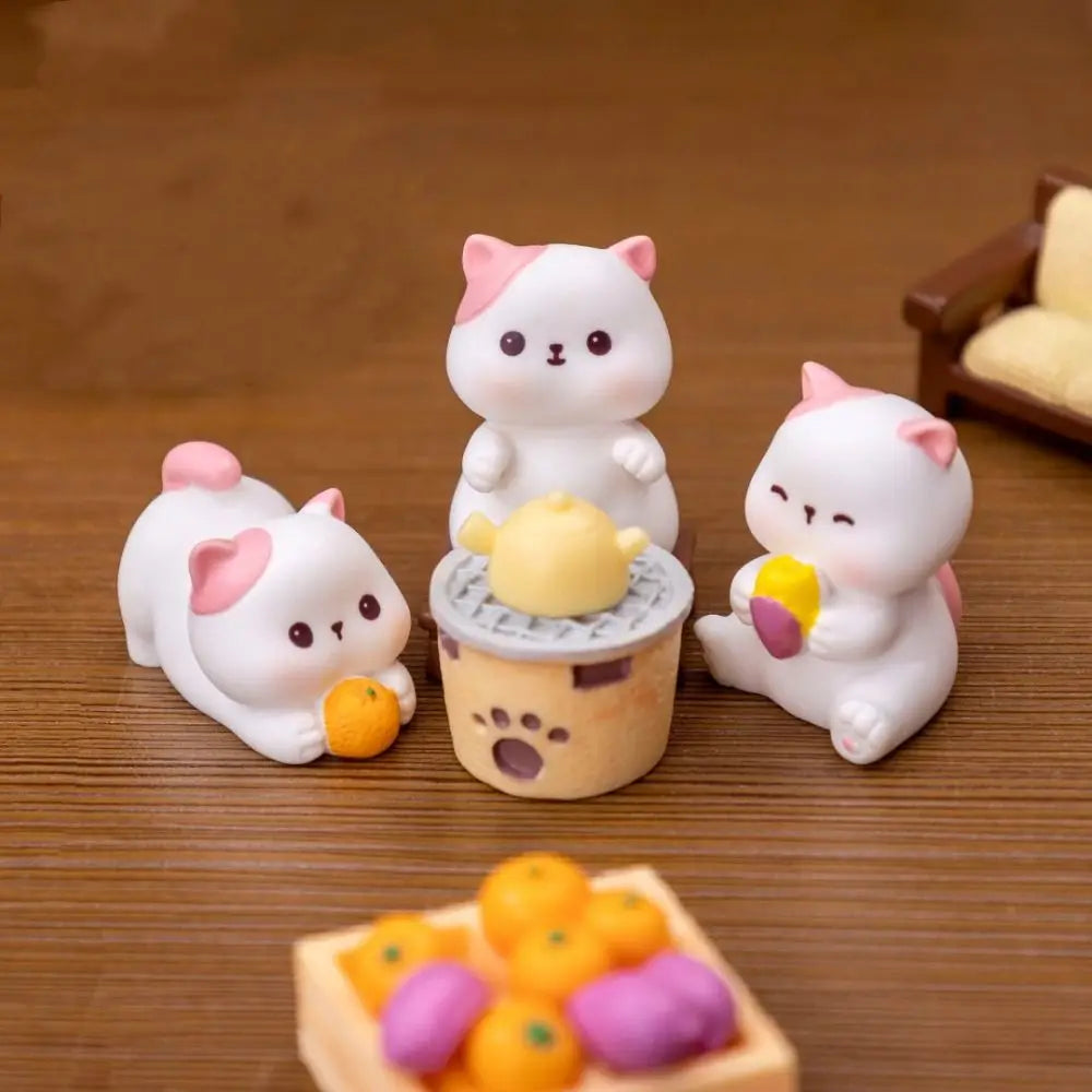 Add charm to your dash with KittyNook Cat Co.'s Creative Cat Doll Car Ornament—3 cute resin cats with pink ears.