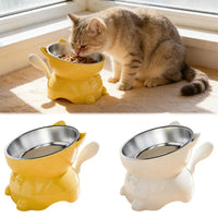Thumbnail for A cat eats from a yellow, cat-shaped KittyNook Cat Co. Elevated Cat Food Bowl with isolated yellow and white versions below.