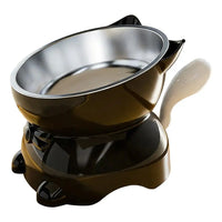Thumbnail for KittyNook Cat Co. Elevated Cat Food Bowl with Cute Ear Stand: a black cat-shaped feeder with a steel bowl and white handle.