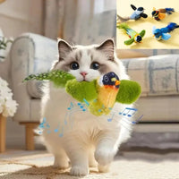 Thumbnail for A white cat carries the KittyNook Cat Co. Ultimate Interactive Chirping Bird Toy indoors, musical notes nearby.