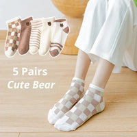 Thumbnail for Woman wears checkered socks, with four more pairs of KittyNook Cat Co. Sweet Kitty Pink Short Tube Socks displayed above.