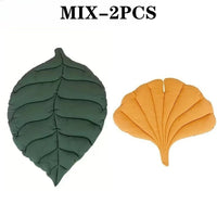 Thumbnail for Two green and yellow leaf-shaped Leaf Pattern Cat Sleeping Mat units.