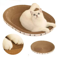 Thumbnail for White cat on KittyNook Cat Co. Oval Corrugated Cat Scratching Board; close-ups of paws and empty board below.