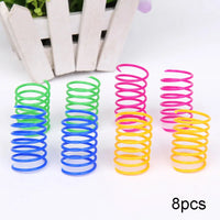 Thumbnail for Eight KittyNook Colorful Spiral Spring Cat Toys—green, blue, yellow & pink—stand upright on a white surface.