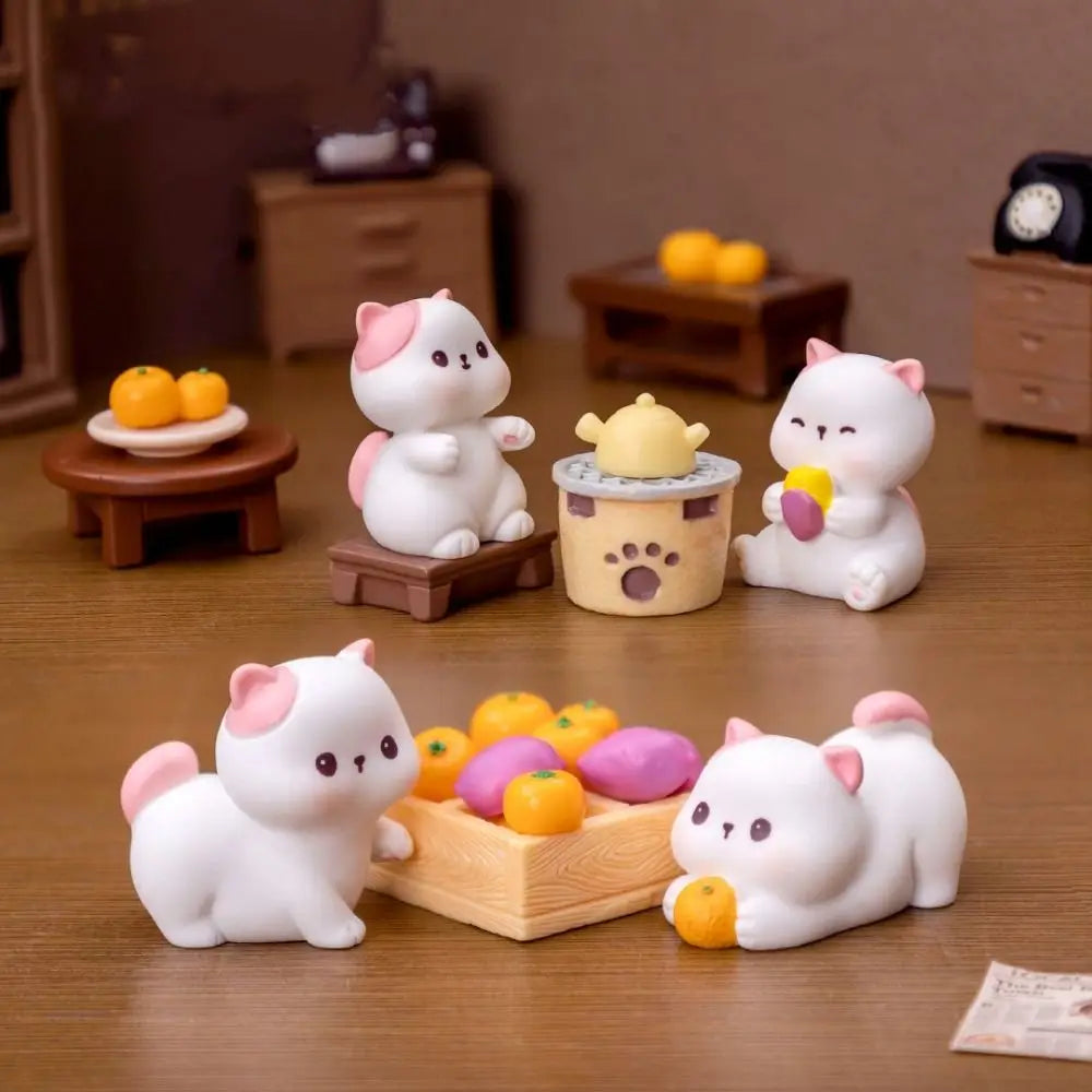The KittyNook Cat Co. Creative Cat Doll Car Ornament features four resin cats with pink ears—cute decor for cat lovers' cars.