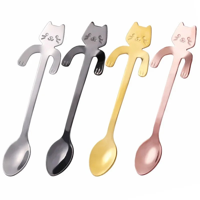 The KittyNook Cat Co. Cat Cling Stainless Steel Mug Spoon is a cute cat-face spoon, perfect for your morning mug.