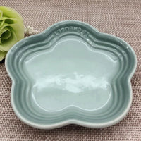 Thumbnail for KittyNook Cat Co. Extra Wide Raised Flower Cat Bowl in light blue on a placemat, with a green faux flower nearby.