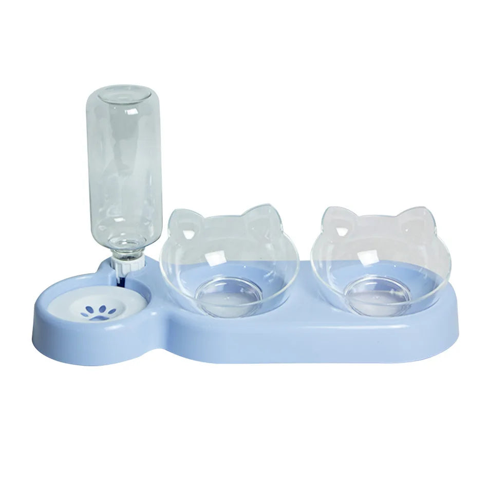Light blue KittyNook Cat Co. feeder with cat-ear bowls and an Automatic Water Renewal Cat Bowl on the left side.