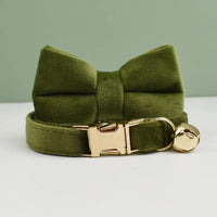 Thumbnail for KittyNook Cat Co.’s Velvet Cat Collar features olive green velvet, a matching bow tie, gold buckle, and bell for a purrfect fit.
