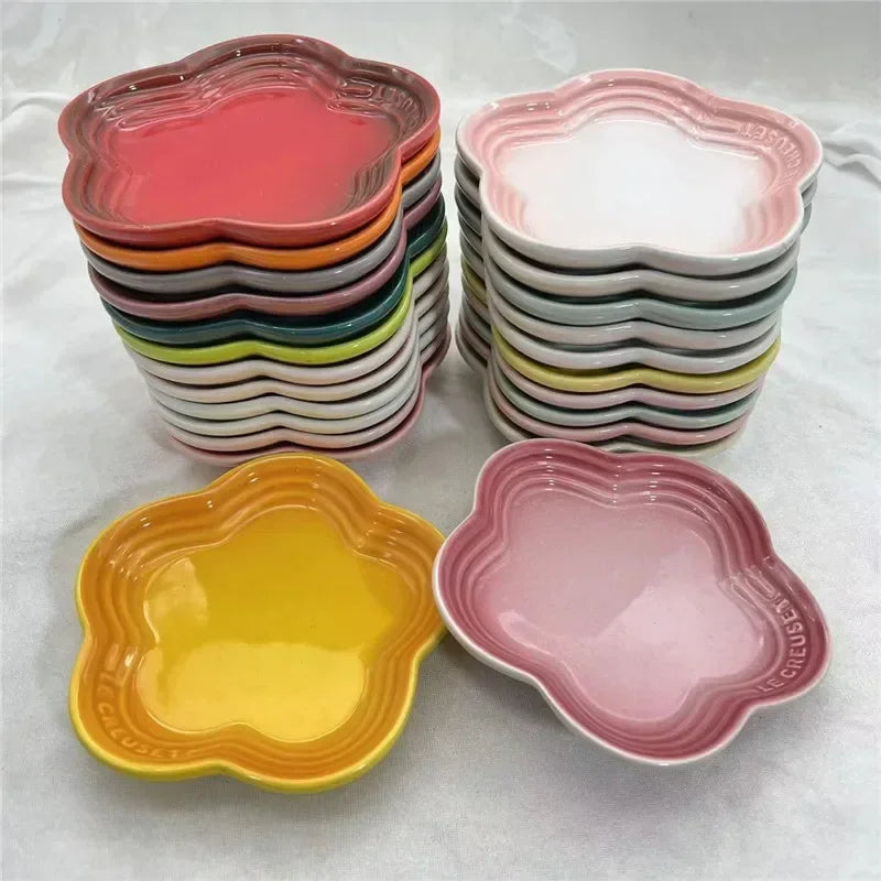 KittyNook Cat Co. Extra Wide Raised Flower Cat Bowl: colorful, flower-shaped ceramic plates in yellow and pink.